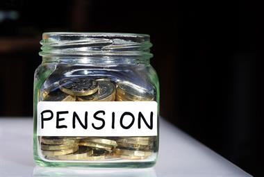 Jar of pound coins labelled 'pension'