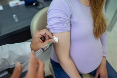 Pregnant woman receives vaccination